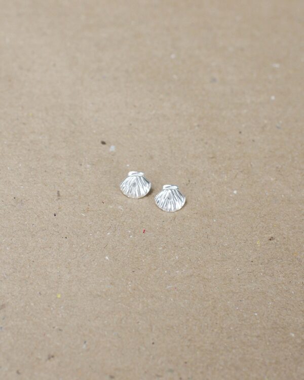 Brinco Conchinha Linha Ícone